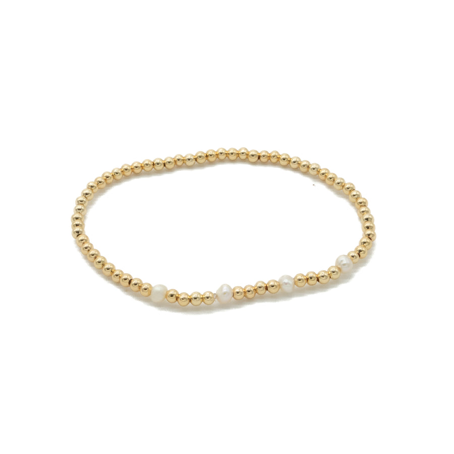 Pulsera elástica perlas con dorado