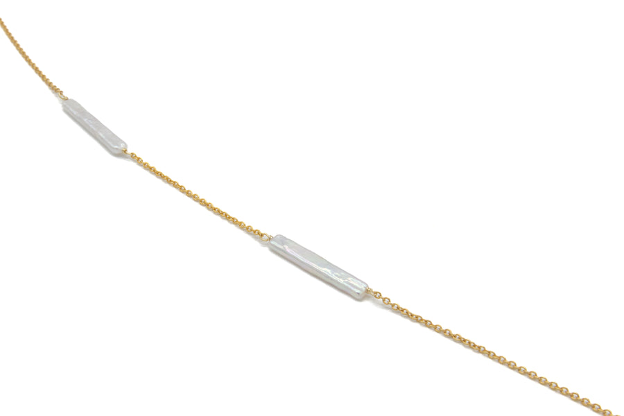 Collar largo con perlas largas