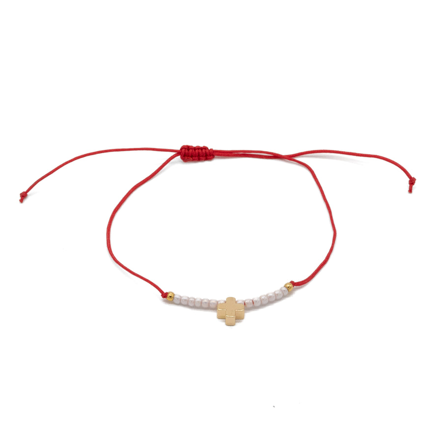 Pulsera ajustable con cruz y chaquira
